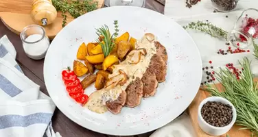 Juicy Grilled Steak Served with Crispy Potato Wedges