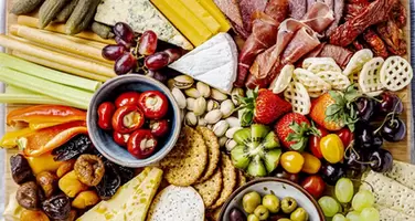 Artisan Charcuterie Board with Cold Cuts Fruits and Cheeses