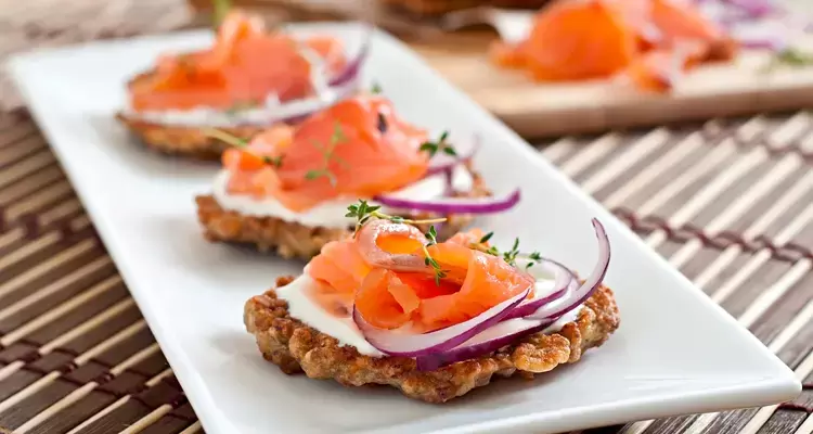 Savory Buckwheat Pancakes Topped with Salted Salmon and Sour Cream