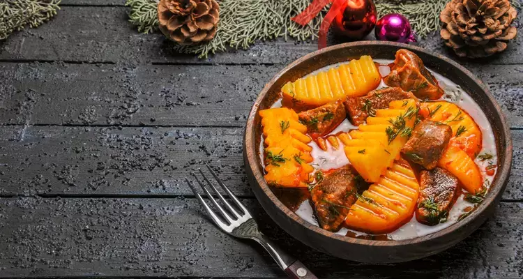 Hearty Meat Soup with Potatoes and Fresh Greens