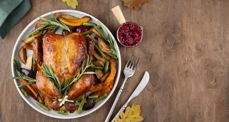 Succulent Whole Chicken Served with Golden Fries and Vibrant Greens